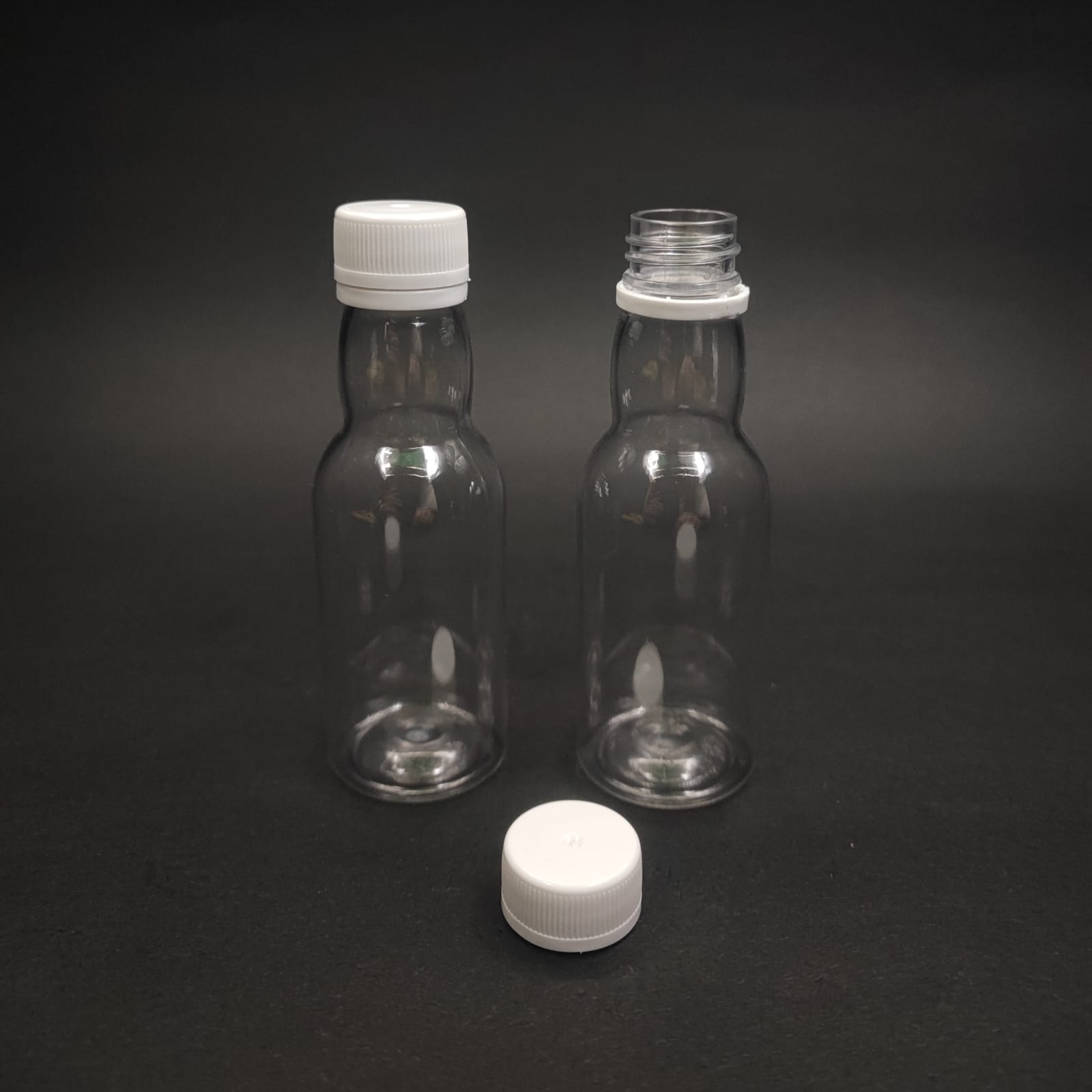 40 CC PET SHOT ŞİŞESİ  - KİLİTLİ BEYAZ KAPAKLI KOLAJEN ŞİŞESİ - 40 ML BOĞAZLI PLASTİK ŞİŞE - ŞEFFAF (KİLİTLİ KAPAK SERTÇE BASTIRARAK KAPANIR)