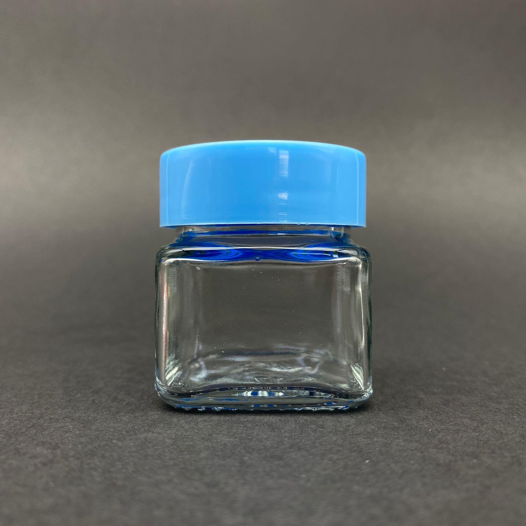 40 CC KARE KAVANOZ - MAVİ PLASTİK KAPAKLI - 40 ML KÖŞELİ TİP CAM KAVANOZ