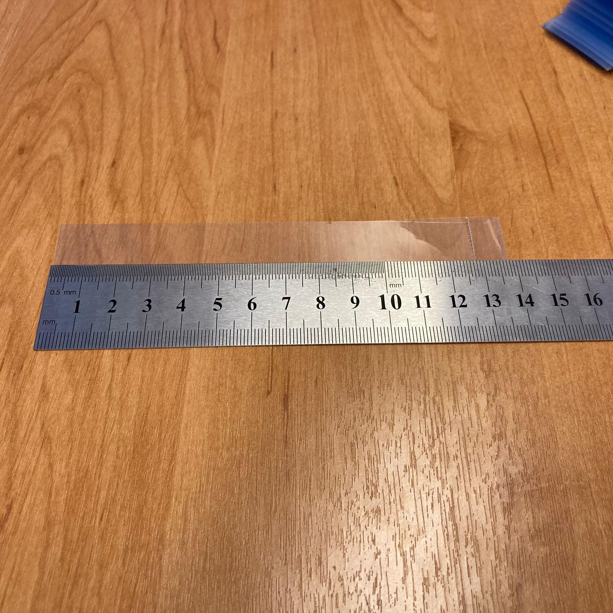 EMNİYET BANDI 77 MM VE 82 MM AĞIZ UYUMLU - 100 GR - (YAKLAŞIK 220 ADET) - YAZISIZ - KAVANOZ GARANTİ BANTI - ŞİŞE EMNİYET BANDI - KAVANOZ GÜVENLİK BANDI