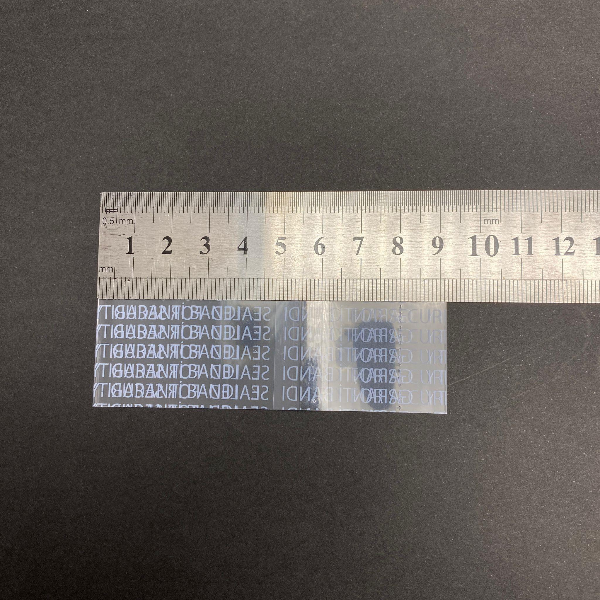 EMNİYET BANDI 53 MM AĞIZ UYUMLU - 100 GR - (YAKLAŞIK 290 ADET) - YAZILI - KAVANOZ GARANTİ BANTI - ŞİŞE EMNİYET BANDI - KAVANOZ GÜVENLİK BANDI
