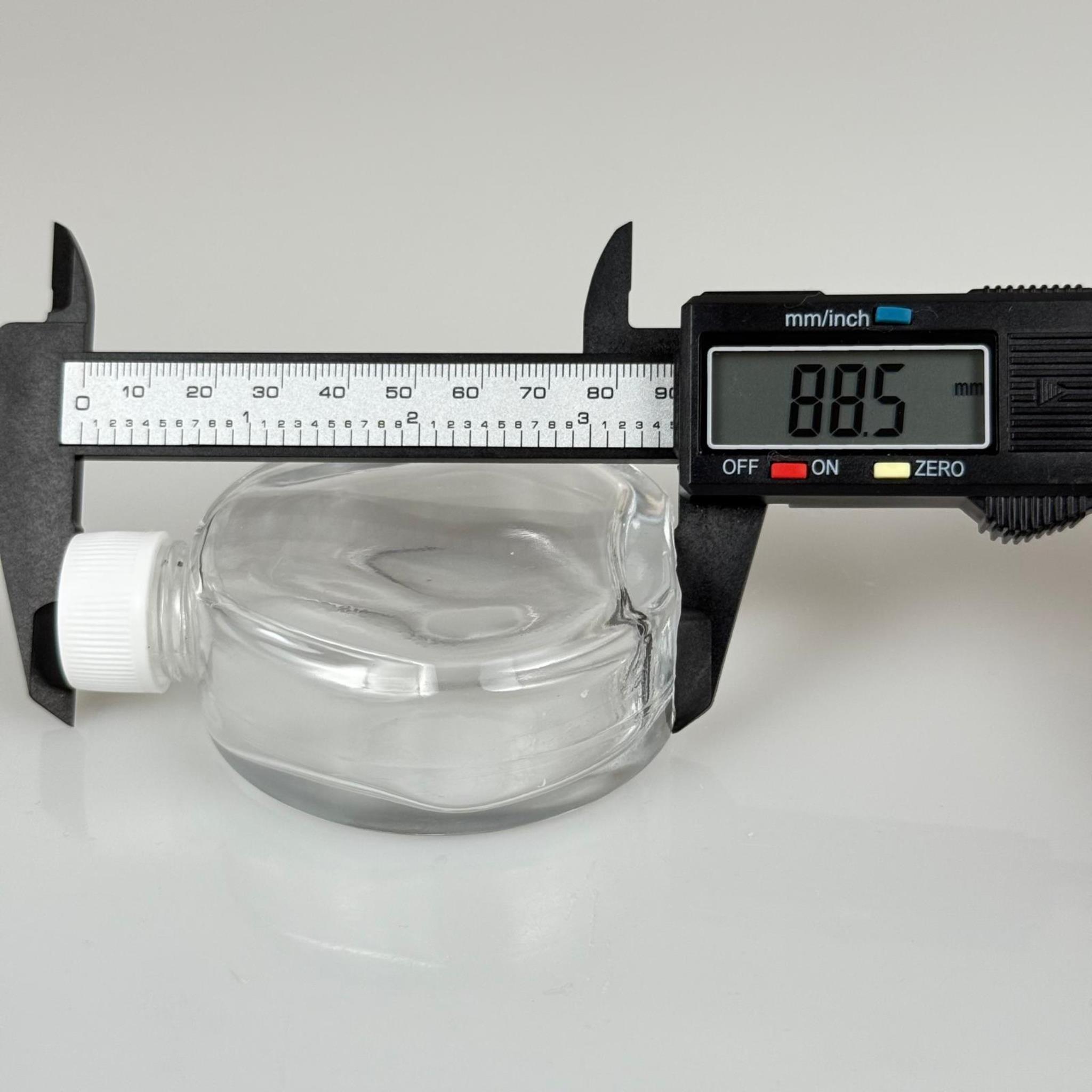 70 CC YASSI OVAL CAM ŞİŞE - BEYAZ PLASTİK KAPAKLI - 70 ML YUVARLAK CAM ŞİŞE